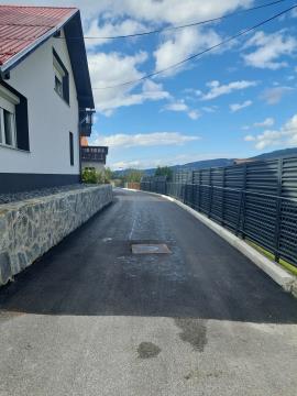 Rekonstrukcija ceste JP Na Šancah 63 do 71a